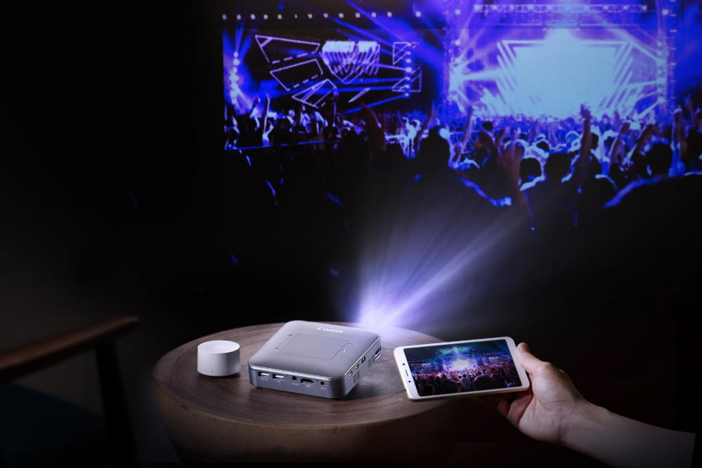 Canon introduces products for business and camera features 90 CA MiniProjector HomeTheatre Silver V1