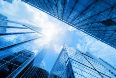 depositphotos 79480642 stock photo modern business skyscrapers 1