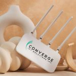 : "Converge ICT fiber optic internet installation with technician working on cables.