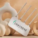 : "Converge ICT fiber optic internet installation with technician working on cables.