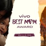 : "Vivo 'Best Mom Award' certificate with flowers on a table.